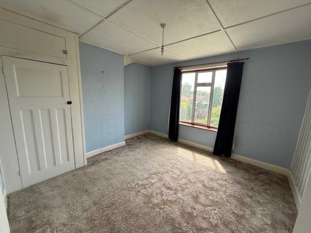 Lot: 149 - SEMI-DETACHED HOUSE FOR IMPROVEMENT IN POPULAR RESIDENTIAL AREA - Bedroom 2 with window to the rear
